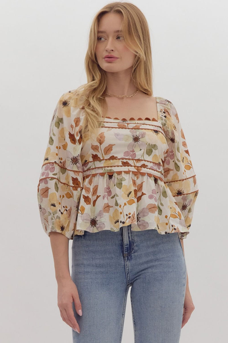 Floral print elasticized ¾ balloon sleeved peplum top