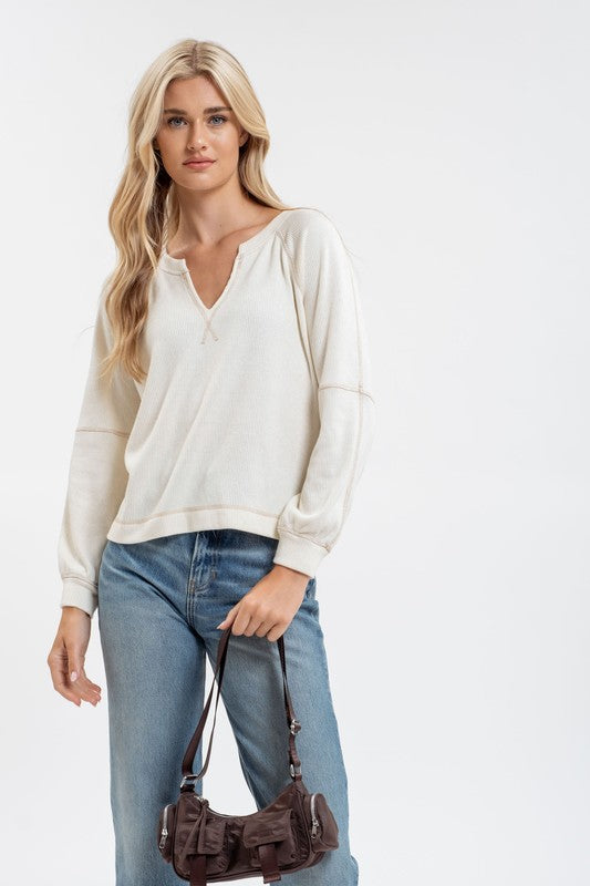 SPLIT NECK LONG EXTENDED SLEEVE RAGLAN KNIT TOP