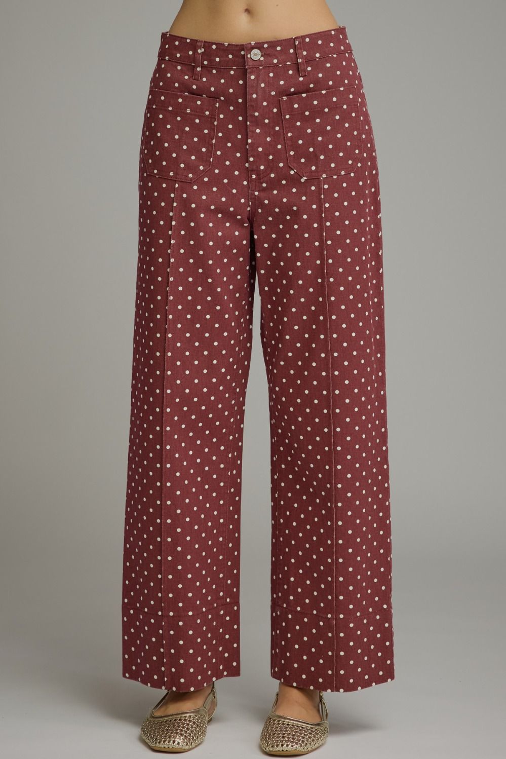 Polka dot pants featuring front and back pockets