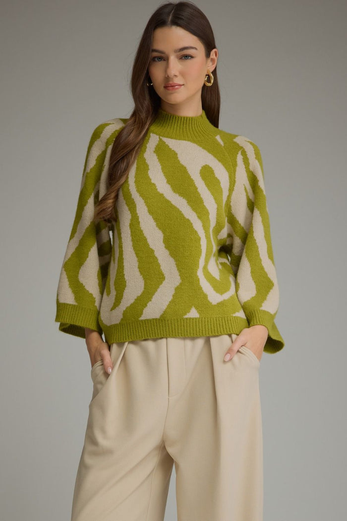 Abstract print ¾ sleeve sweater top with a mock neck