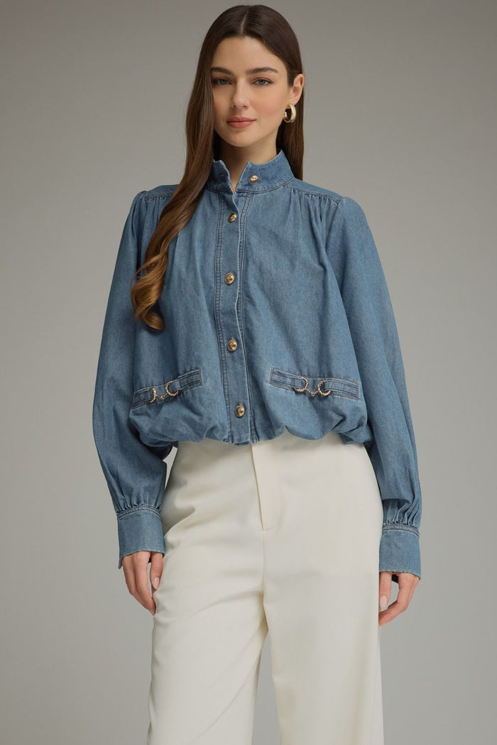 Solid long sleeve denim top with a high neckline and button closure at front
