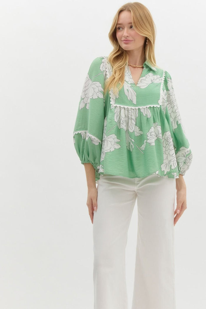 Floral print 3/4 sleeve collared v-neck top