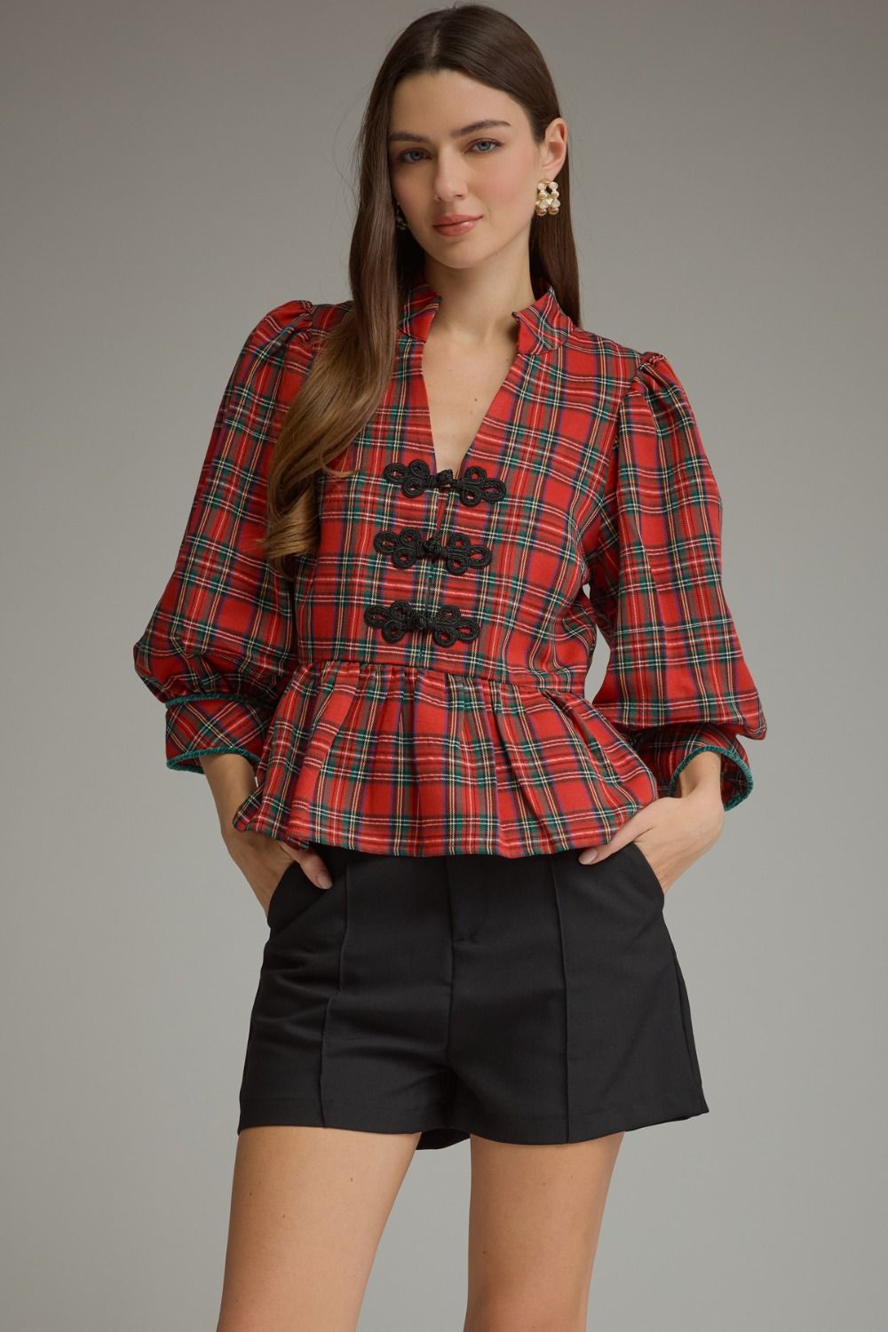 Plaid 3/4 puff sleeve top with contrast trim and peplum hem